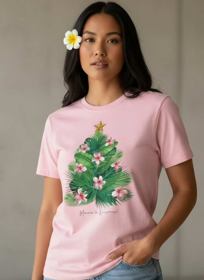 Pink t-shirt with a Christmas tree design on a textured gray background