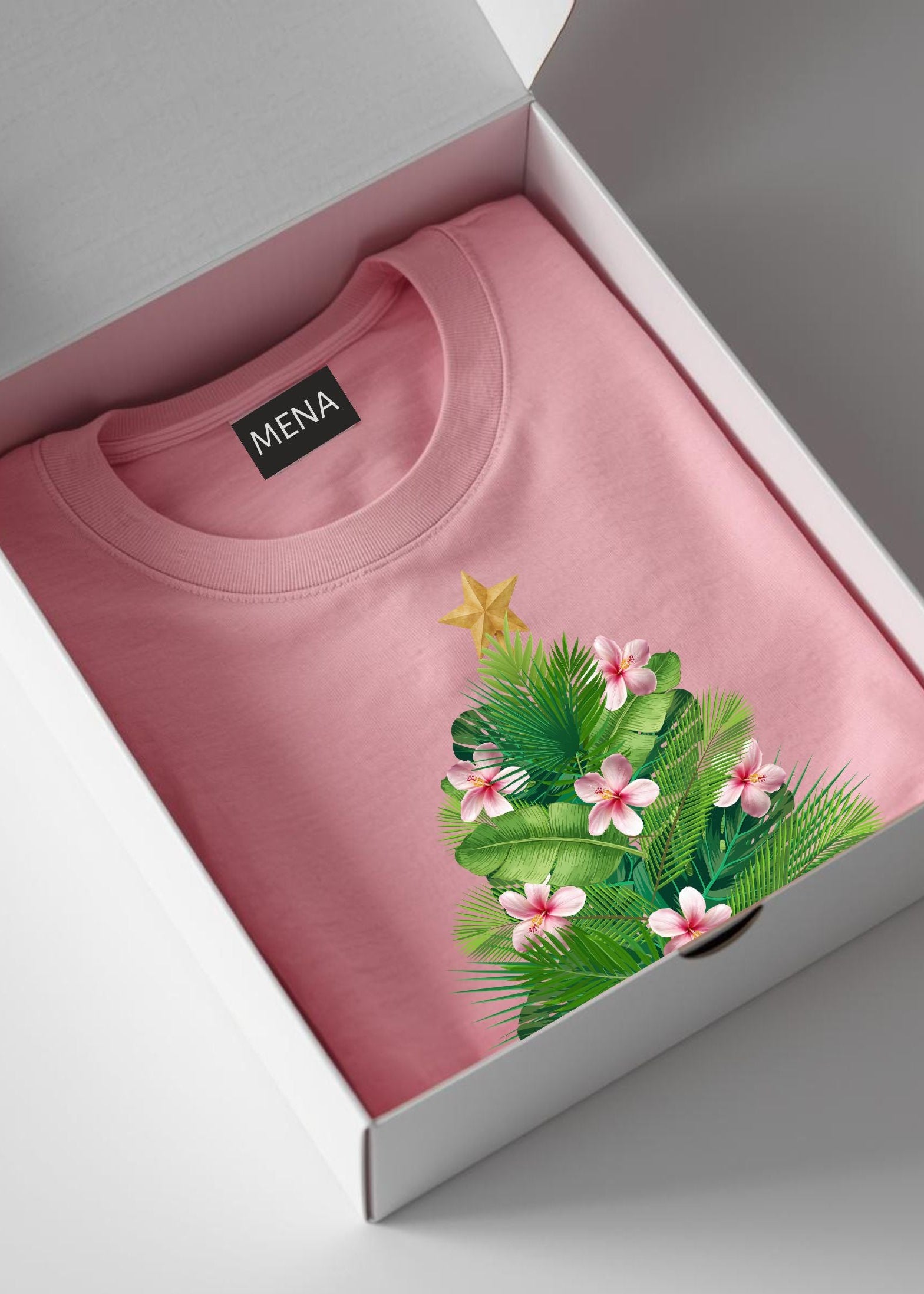 Pink sweatshirt with floral design and 'MENA' label in a box