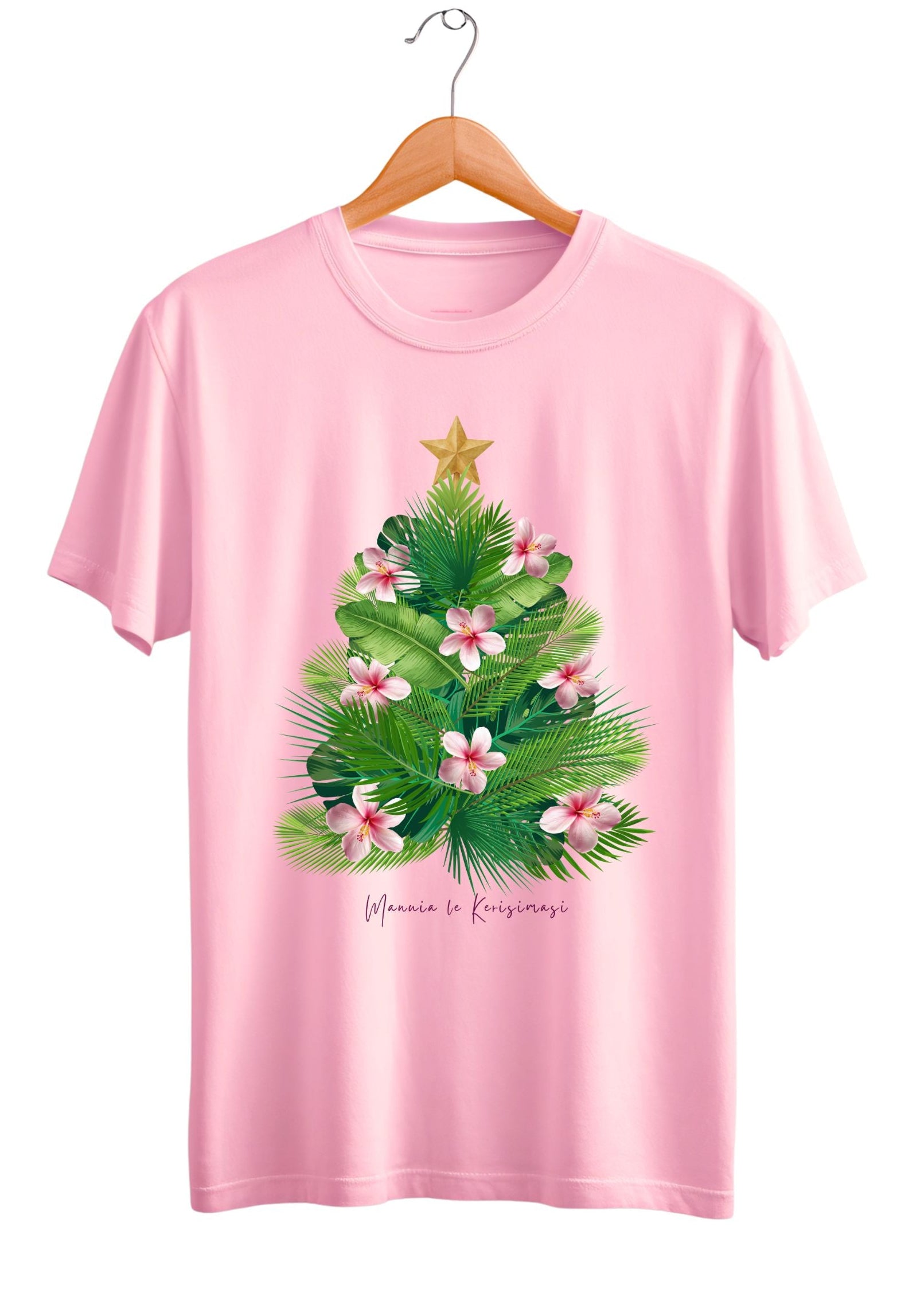 Pink t-shirt with a Christmas tree design on a hanger against a white background